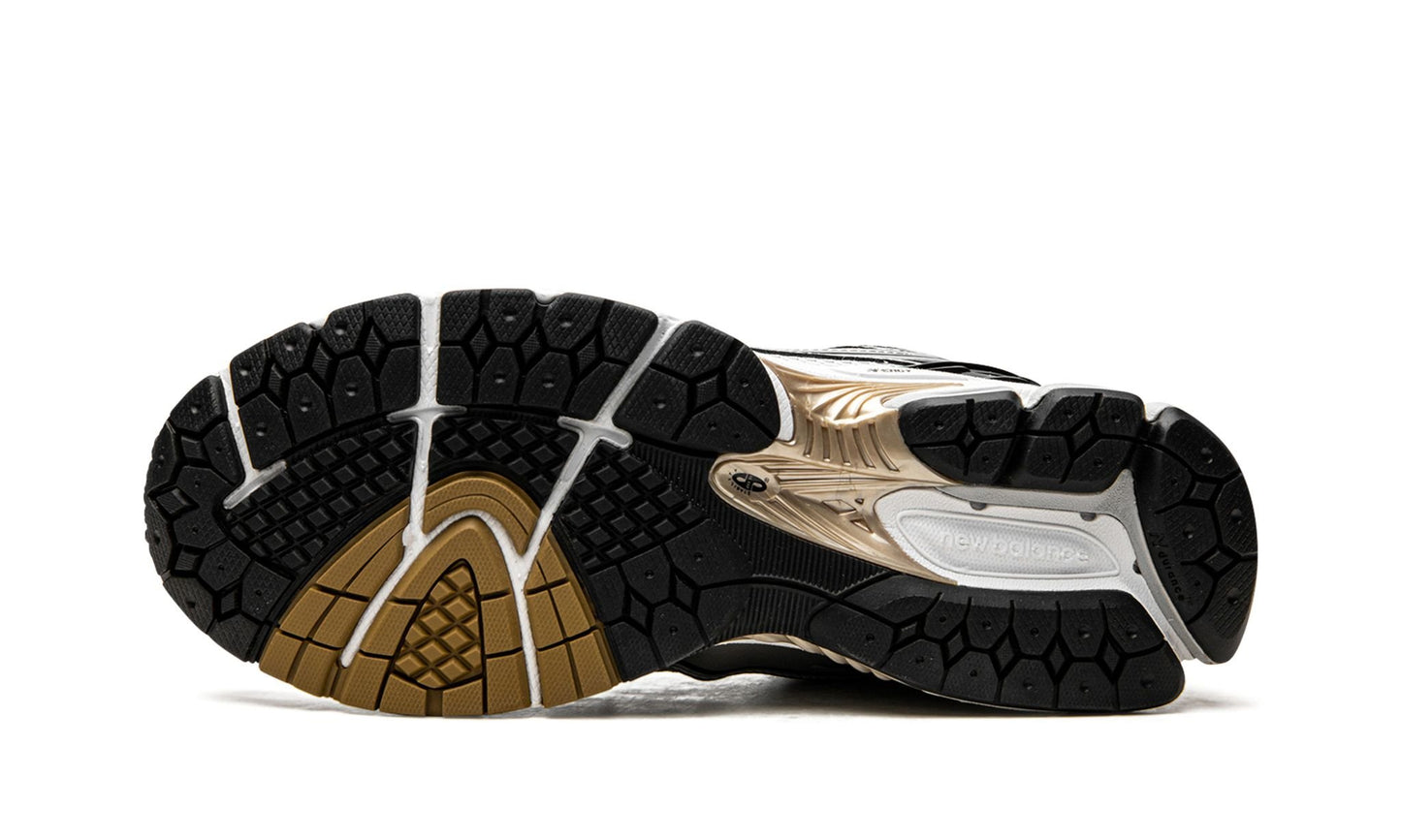 NEW BALANCE
1906R
"White / Gold"