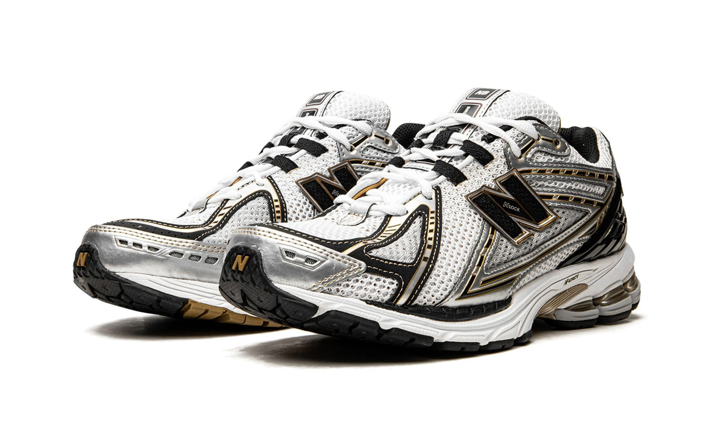 NEW BALANCE
1906R
"White / Gold"