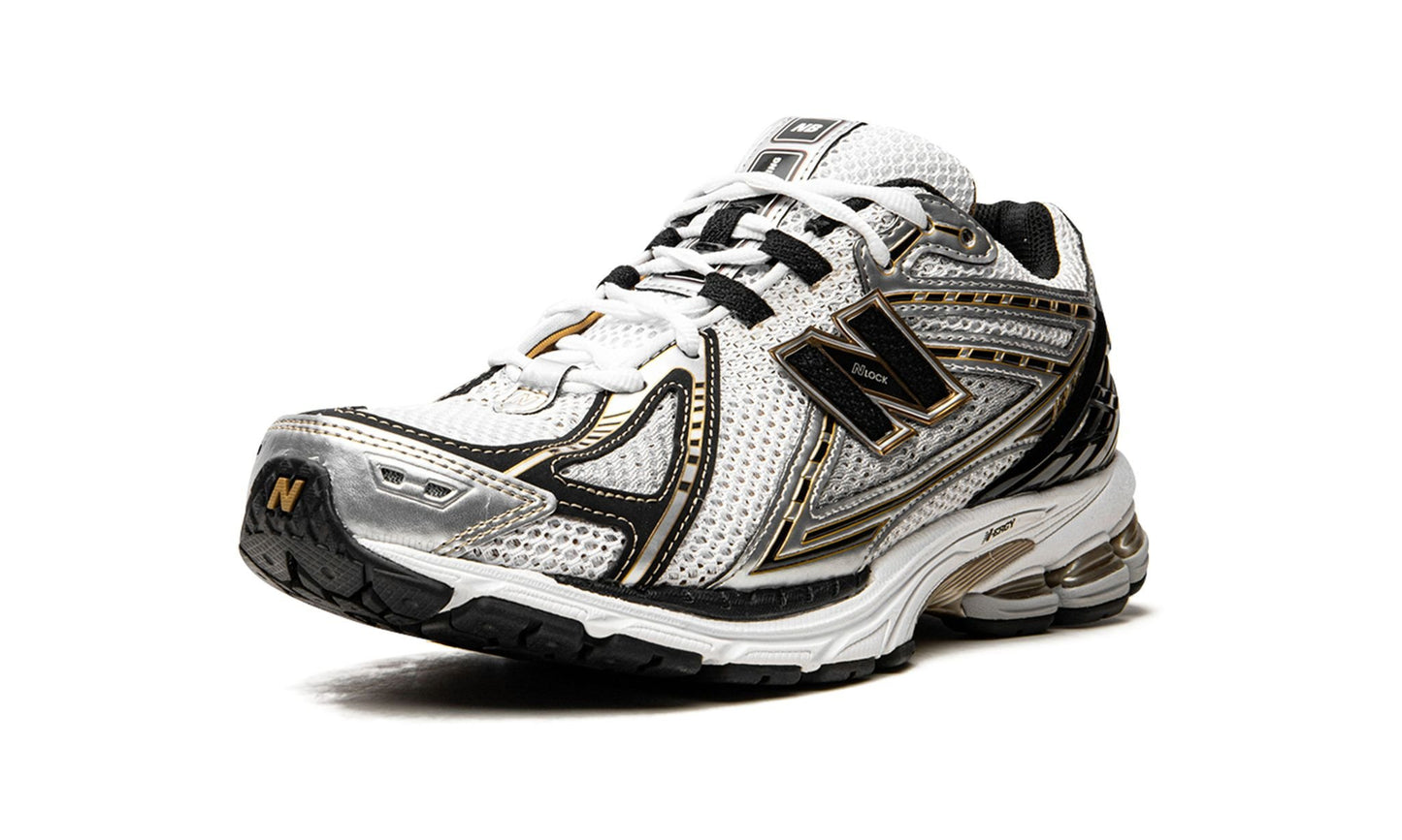 NEW BALANCE
1906R
"White / Gold"