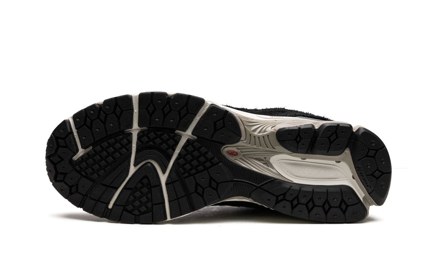 NEW BALANCE 2002R
"Protection Pack - Black / Grey"